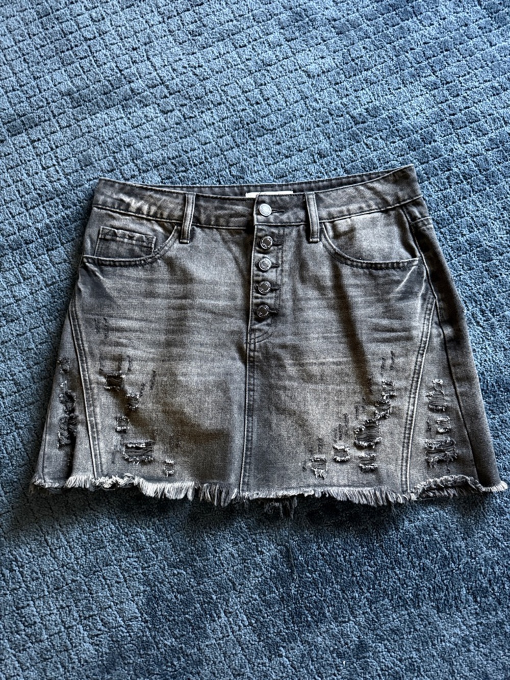 Distressed Black Denim Mini Skirt with Button Front